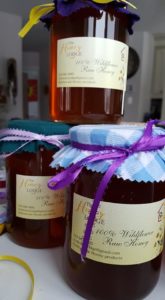 moccasins, honey, tealey products and the honey lodge, pass the feather, aboriginal arts and collective, artist