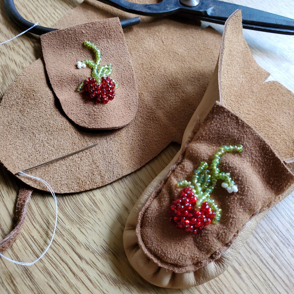 Rachel Volkmann, beadwork, beader, crafts, craft maker, featherwork, jewelry, jewelry maker, mobiles, moccasins, Indigenous Artist, First Nations, Indigenous Arts Collective of Canada, Pass The Feather