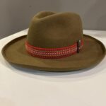 Ronald Joseph Kerr Brown hat with ribbon and clip