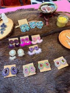 Lisa Roundpoint - Little Bear Design table assorted with beaded earrings