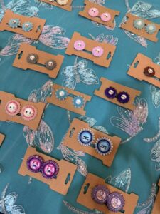 Lisa Roundpoint - Little Bear Design table assorted with beaded character earrings