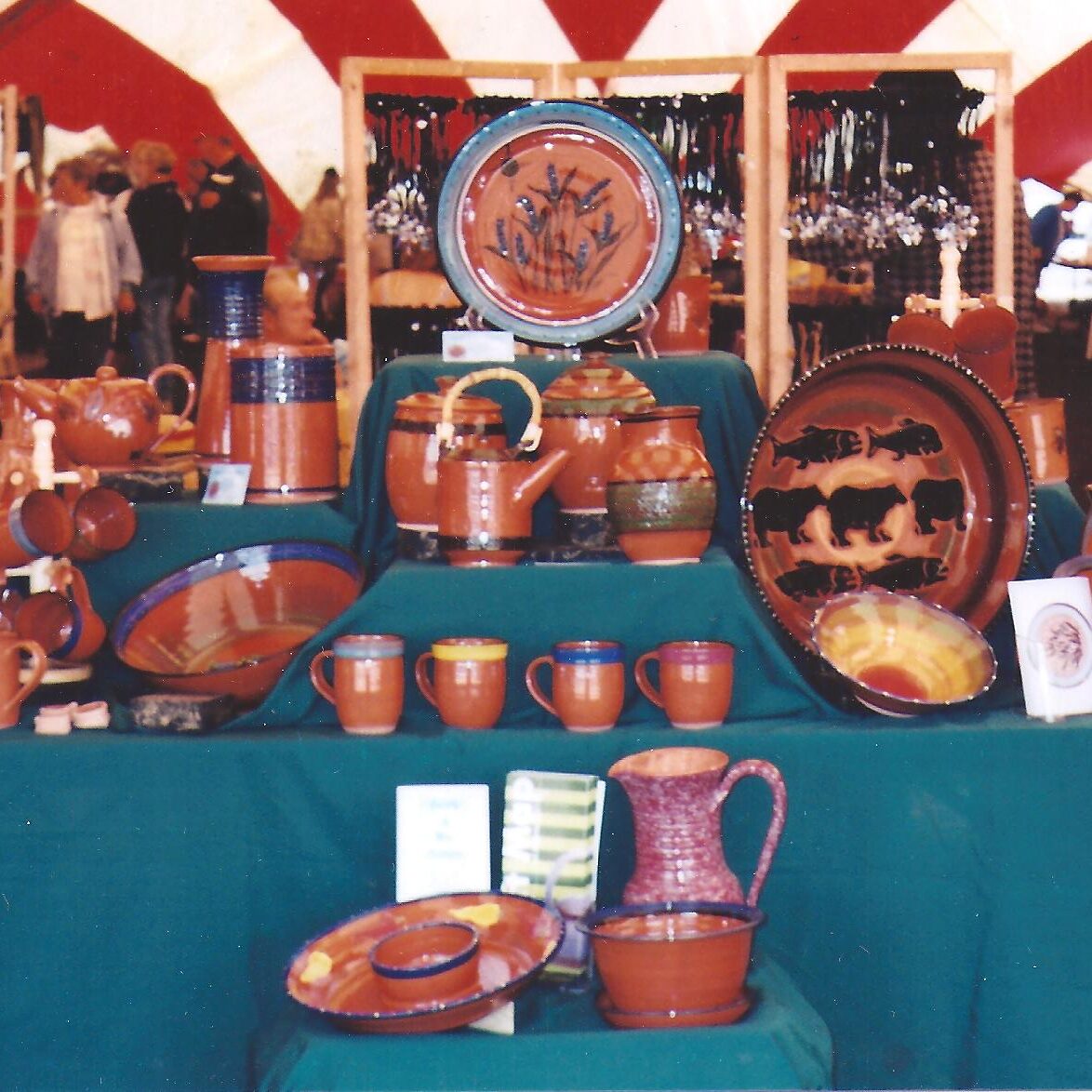 Jody L’Hirondelle Swanson Red Hot Pots Pottery Vendor set up