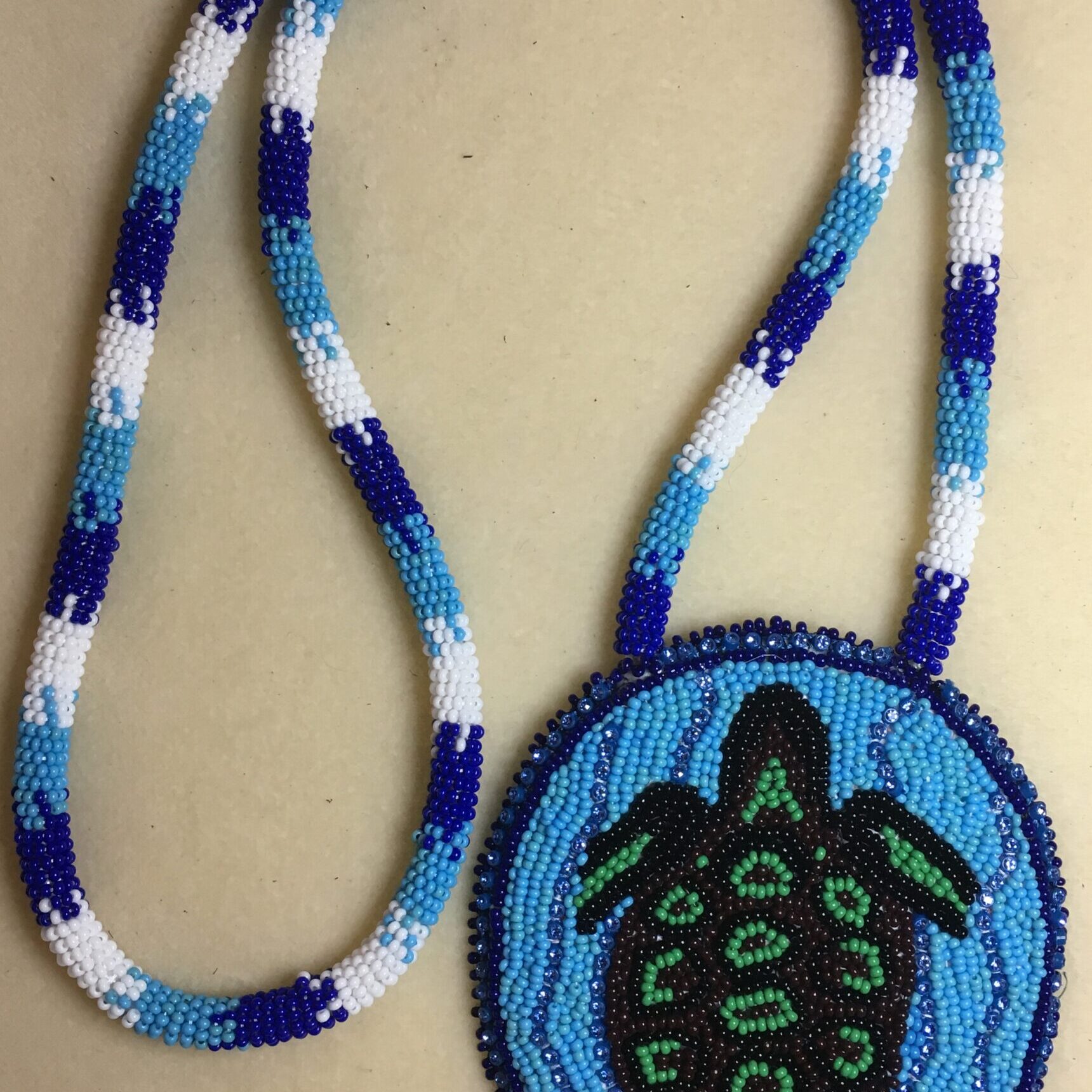 Michelle Goulet, Jewellery, beadwork, leatherwork, quilting, ribbon skirts, Indigenous Artist, First Nations, Indigenous Arts Collective of Canada, Pass The Feather