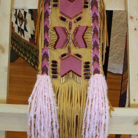 Matricia Bauer, Indigenous artist, beader, beadwork, drum maker, drums, hats, jewellery, moccasins, painter, painting, first nations, indigenous arts collective of canada, pass the feather.