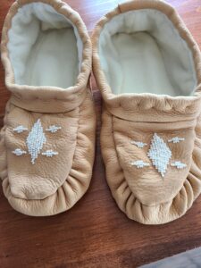 Jennifer Brant, leatherwork, fur, moccasins, Indigenous Artist, First Nations, Indigenous Arts Collective of Canada, Pass The Feather
