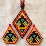 Beth Queau, crafts, beadwork, feathers, medicine bags, jewelry, pop sockets, keychains, purses, Indigenous Artist, First Nations, Indigenous Arts Collective of Canada, Pass The Feather