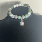 Liberty-Ann, Bead work, artwork, sewing, moccasins, Indigenous Artist, First Nations, Indigenous Arts Collective of Canada, Pass The Feathe