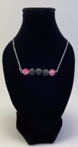 Jamie Consoli, Creeative Gems, Indigenous Art, Pink and Black Beaded Necklace on mannequin neck