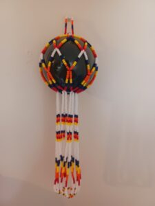 Amanda Lepine -Orange, Yellow, White and Black Beaded Dreamcatcher with black ball in centre