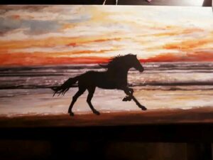 Stephanie Caribou Horse running on the beach painting