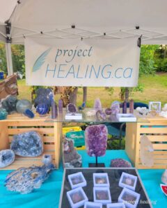 John Standingready Project Healing Banner and table